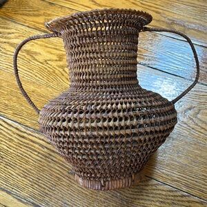 Vintage woven twisted basket with handles.  Made in Philippines. Great condition